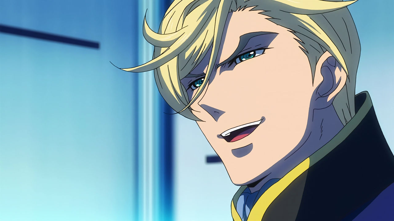 A closeup of McGillis' face, he's laughing