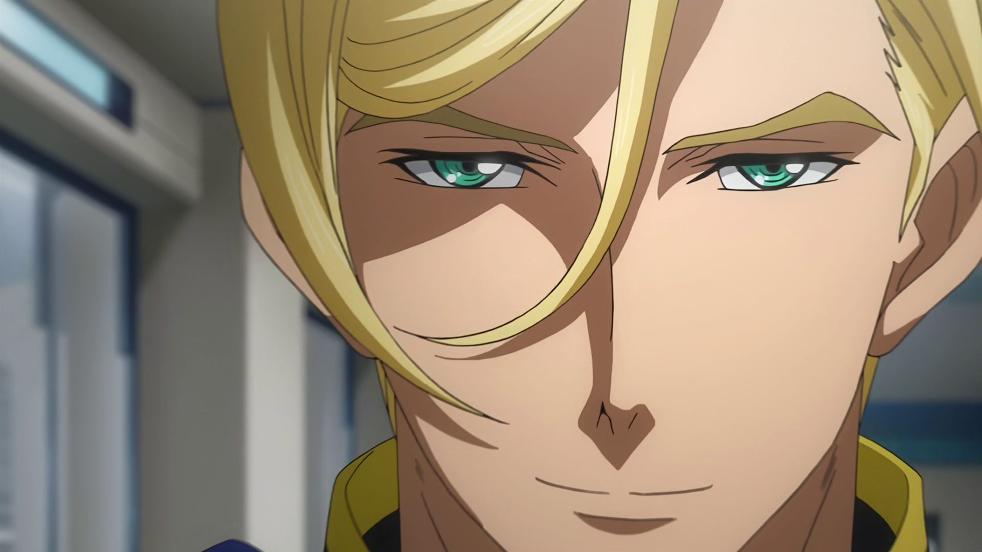 A closeup of McGillis' face, he is smilling