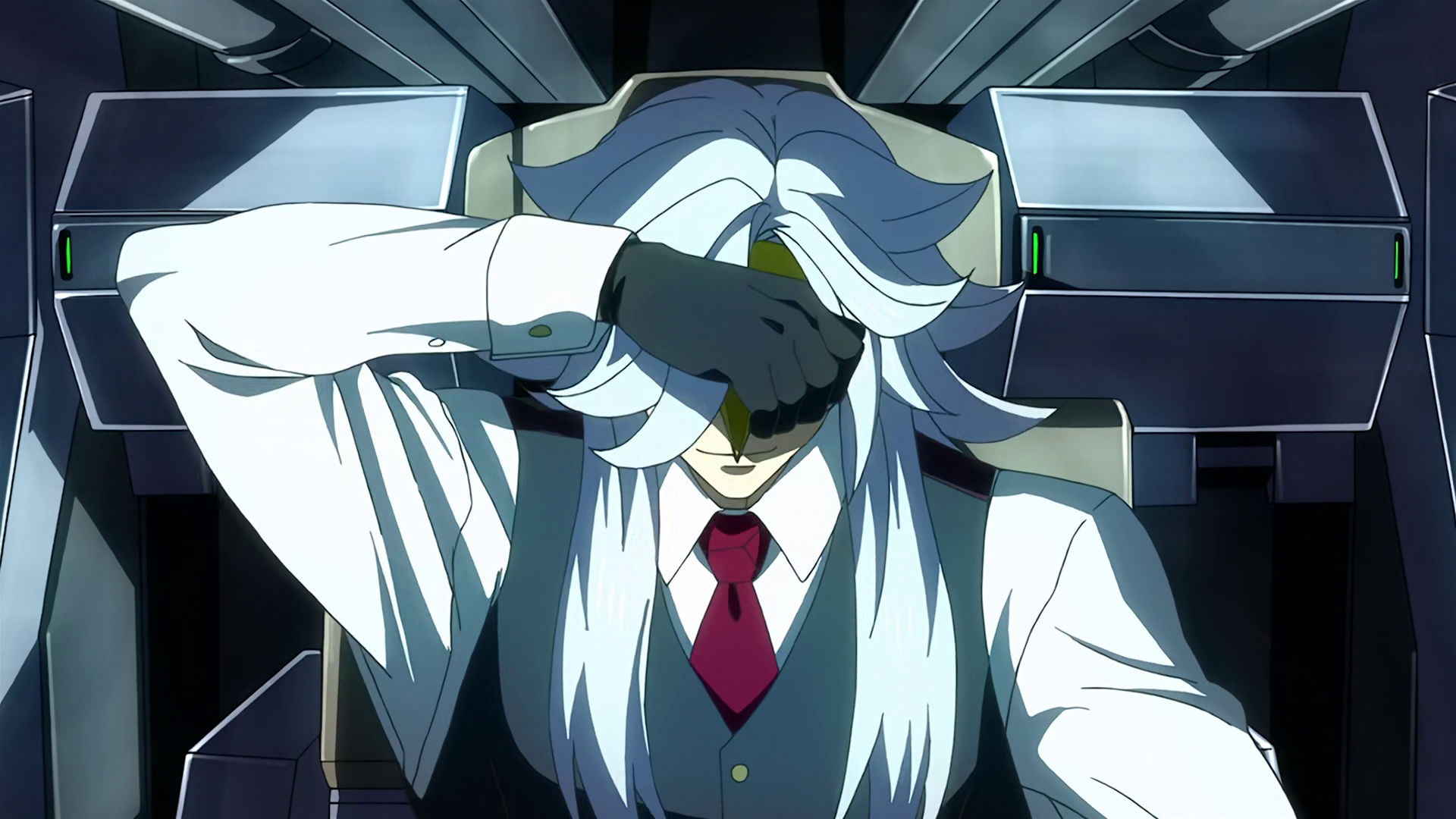 McGillis about to remove the Montag mask from his face, he is inside a mobile suit cockpit.