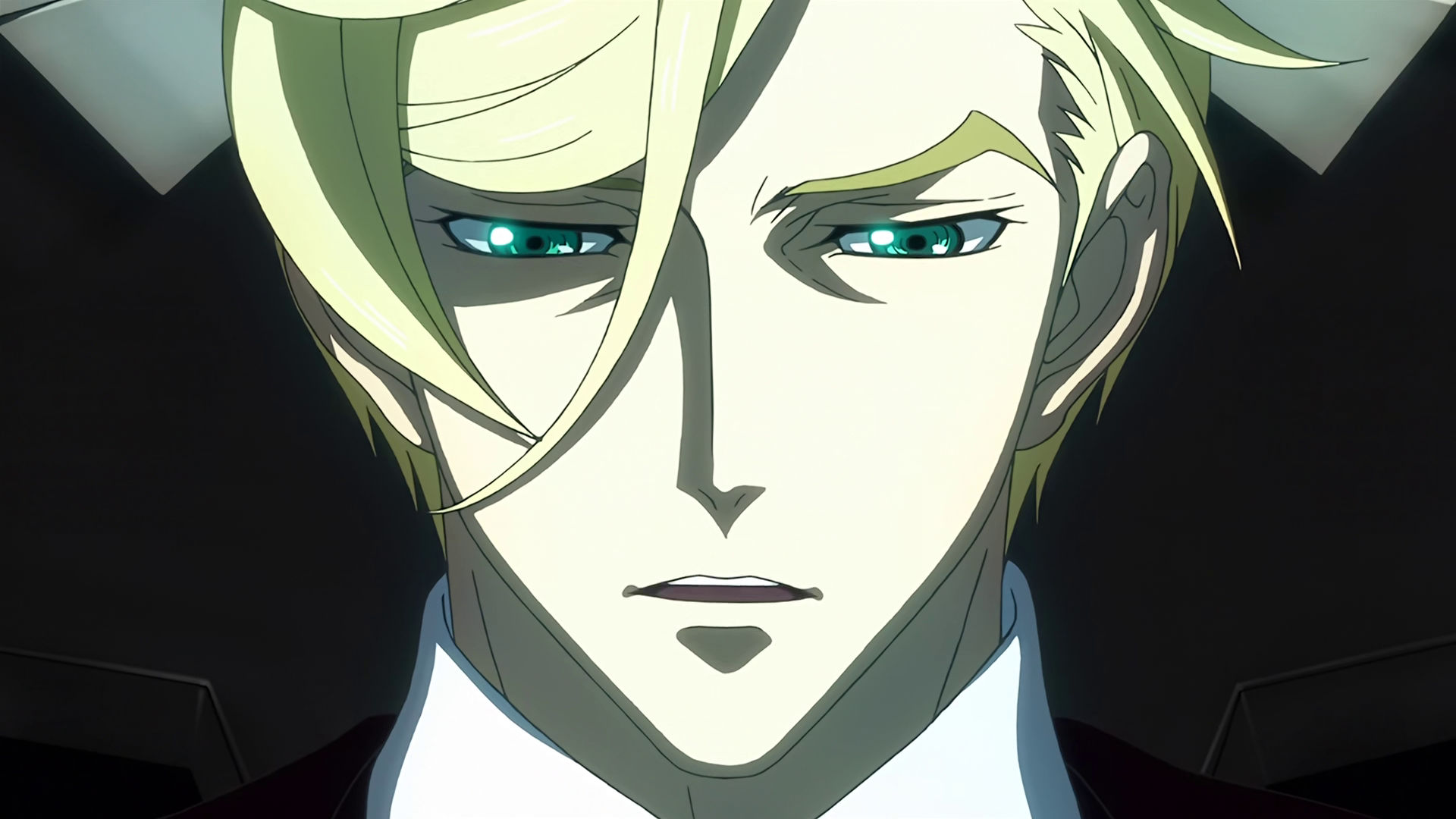 McGillis inside a mobile suit cockpit, he is sad.