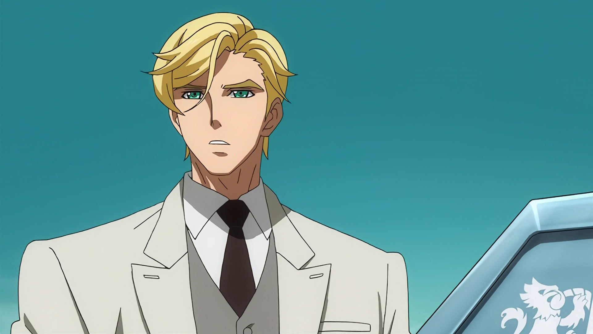 McGillis wearing an off-white suit