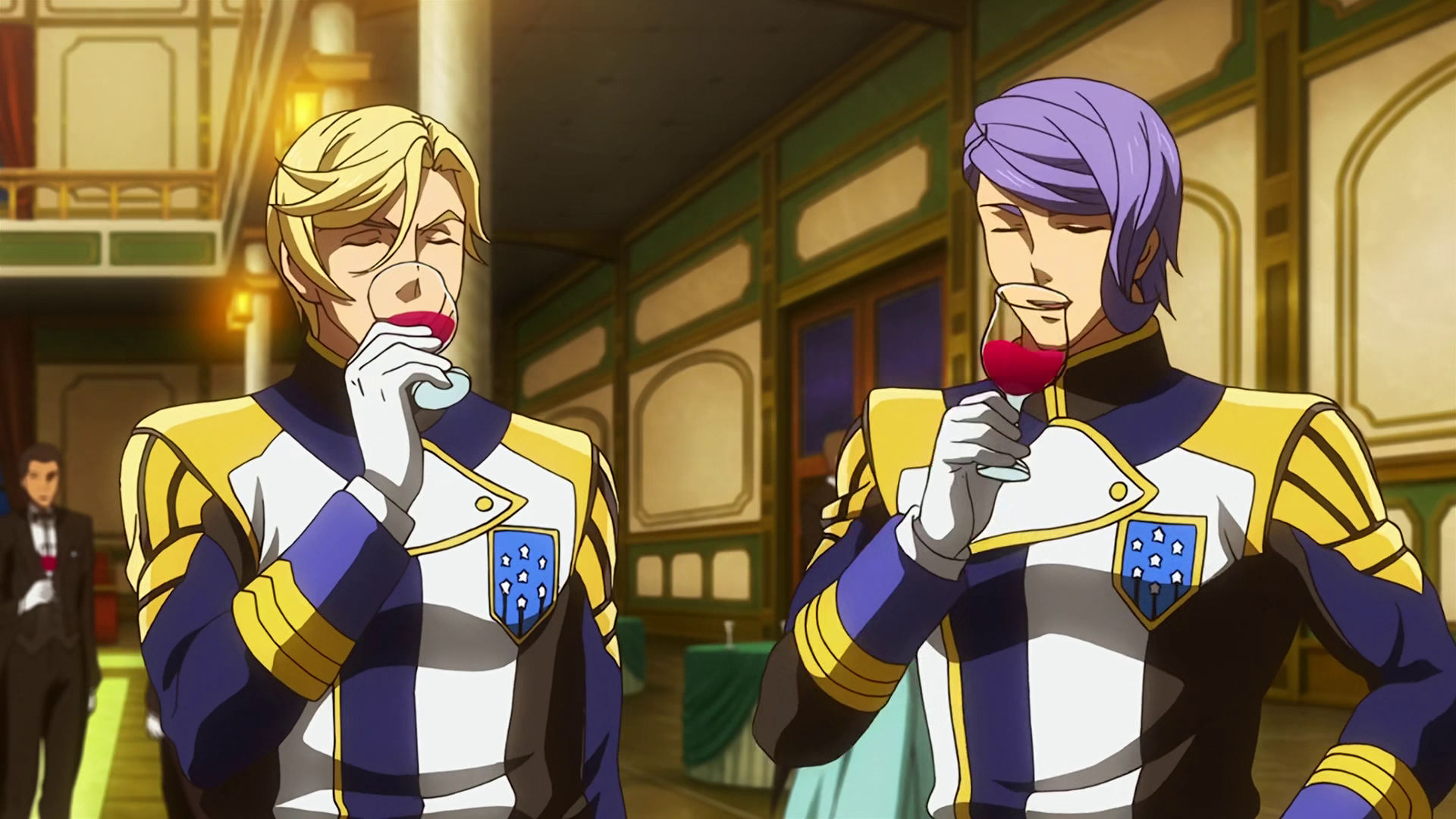 McGillis and Gaelio at a fancy party drinking wine.