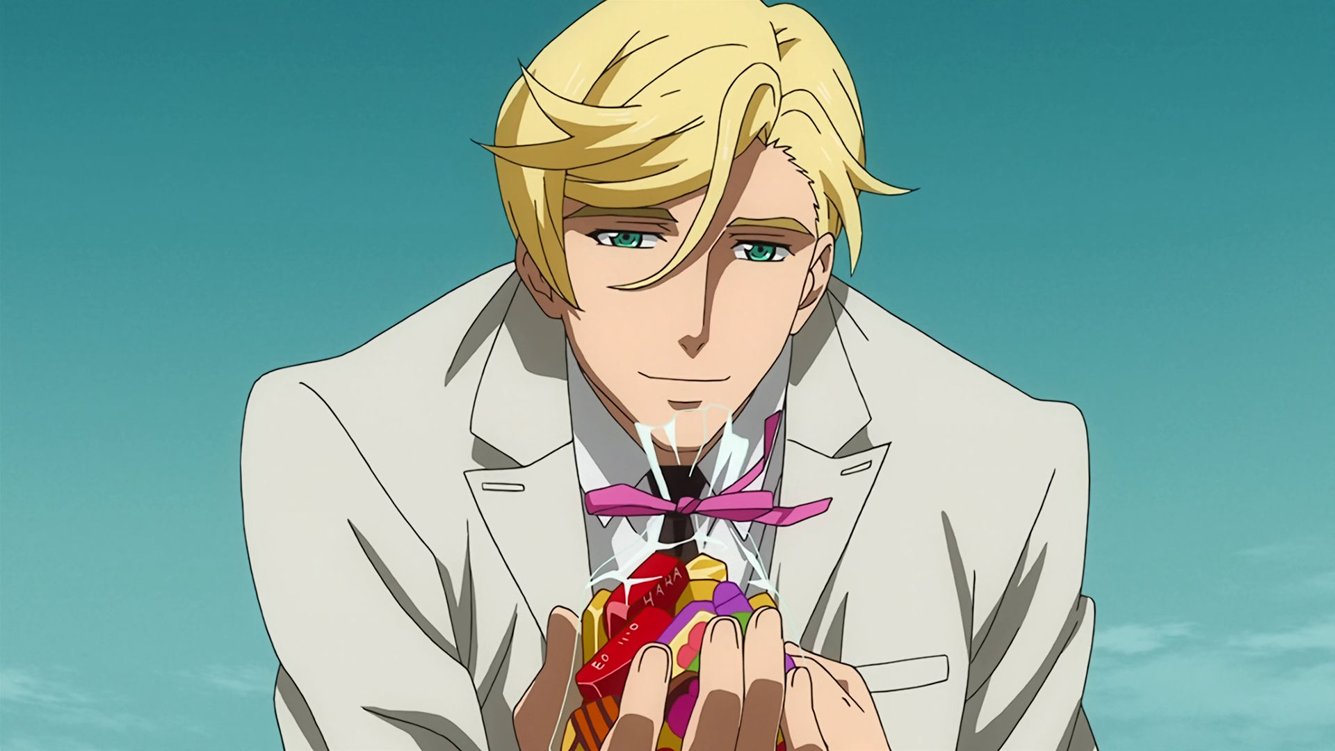 McGillis facing the viewer, gently offering a bag of sweets