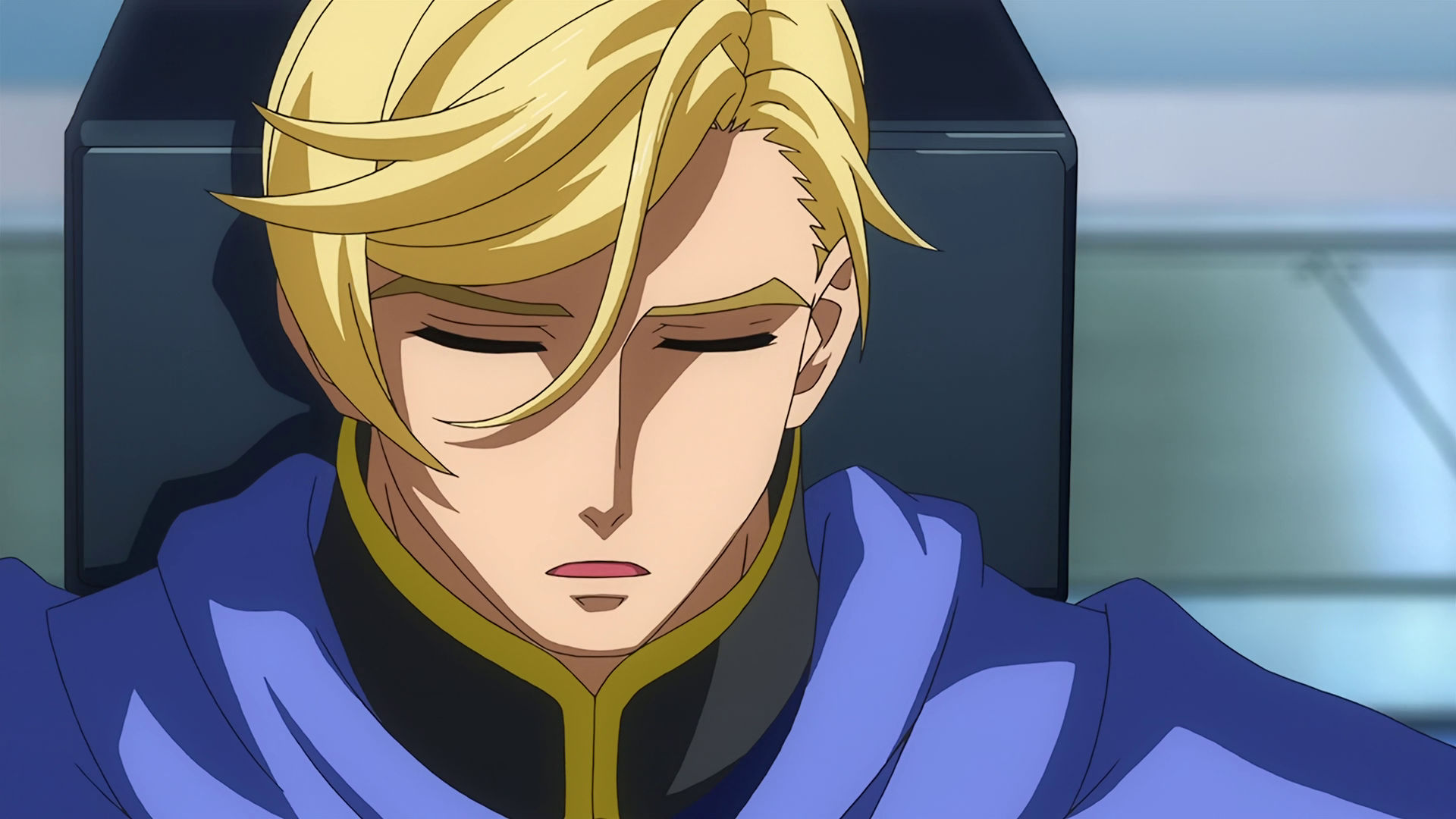 A closeup of McGillis face, he looks pensive