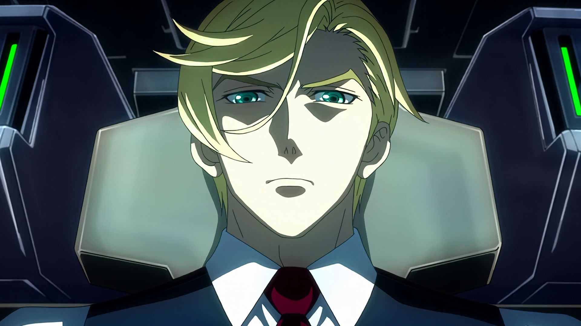 McGillis inside a mobile suit cockpit, he looks angry.
