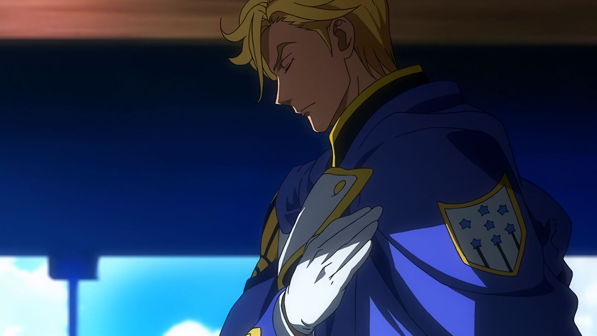 side-view of McGillis with his right hand on his chest and his eyes closed in a salute position.