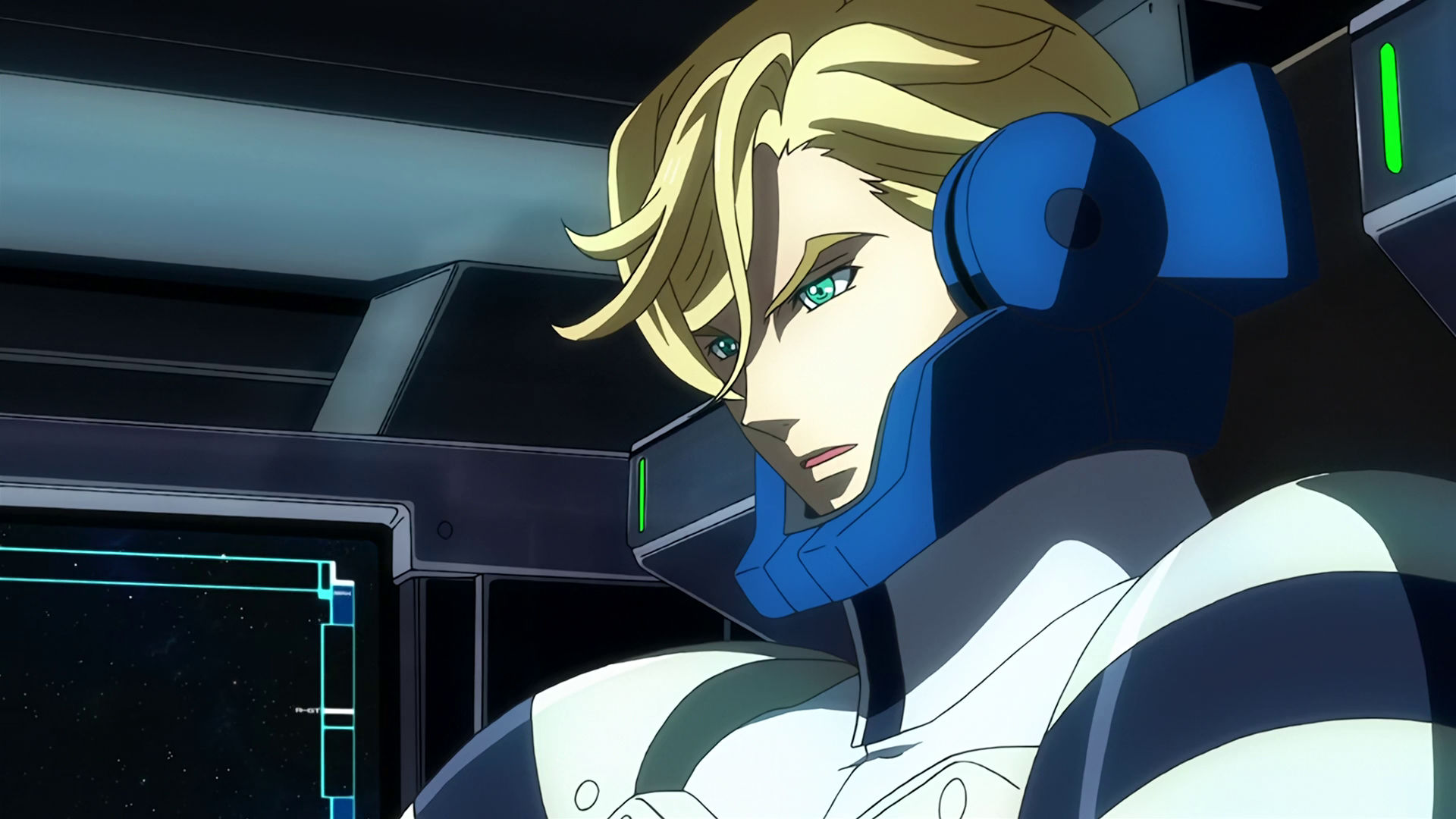 McGillis inside a mobile suit cockpit wearing a pilot normal suit, he looks stunned.
